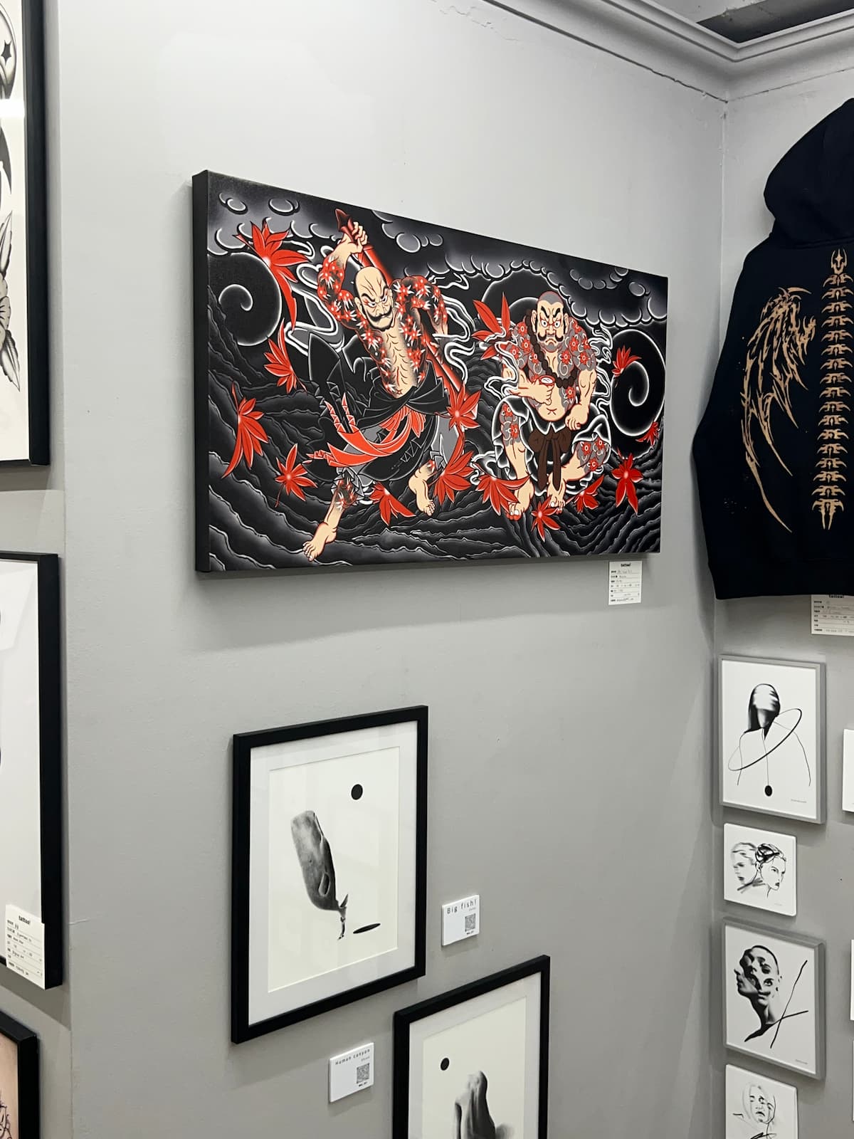 The framed digital drawing on the wall at Nevermind Art Lounge